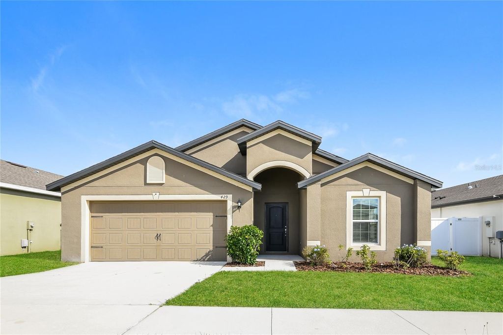Photo of 429 Kensington View Drive, Winter Haven, FL 33880 (MLS # TB8468775)