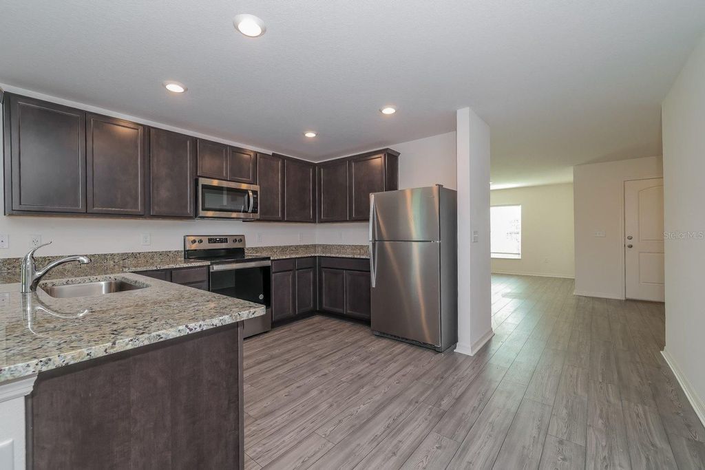 Photo of 429 Kensington View Drive, Winter Haven, FL 33880 (MLS # TB8468775)