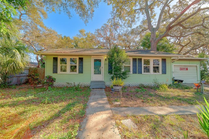 Welcome to this charming 3-bedroom, 1-bath bungalow perfectly blending classic character with thoughtful updates. Inside, you’ll find timeless hardwood floors and an updated kitchen designed for both everyday living and entertaining. Enjoy peace of mind with storm-rated windows throughout, a 2017 HVAC, and a 2015 water heater. Step outside to a large, fully fenced backyard—perfect for pets, play, gardening, or hosting gatherings. The location truly shines: enjoy the convenience of being just steps from Ed C. Wright Park and the Ross Norton Recreation & Aquatic Complex, with plenty of shopping and dining nearby. And when it’s time to unwind, you’re only 10 minutes from the sugar-sand beaches of Clearwater Beach. Whether you’re a first-time buyer, downsizing, or looking for a solid investment, this well-maintained bungalow offers comfort, convenience, and coastal living at its best.