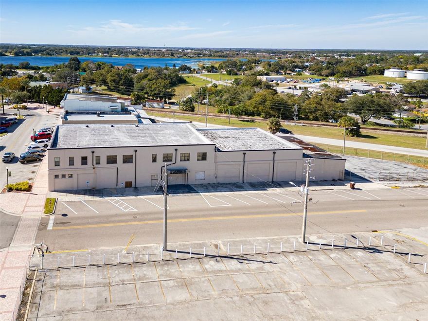 Situated in the heart of Haines City Downtown District, this commercial building offers first-floor accessibility and a prime location. Spanning two stories , the structure features reinforced 2nd-floor columns, ensuring stability and durability.

Equipped with five AC units, 3-phase amp, and a comprehensive security system including fire and burglar alarms, this property is prepared for various business endeavors. The 2nd floor is enhanced with three exhaust fans on the roof, promoting a comfortable environment.

The 1st-floor auditorium boasts impressive 26' high ceilings, while the remainder of the 1st floor features 12' ceilings. The 2nd floor offers separate rooms with 9' ceilings, although some ceiling repairs may be required.

Currently configured with 2-3 apartment setups, this versatile space also includes a cashiers cage and a safe room. A separately deeded parking area adjacent to the building adds to the convenience.

This property presents an excellent opportunity for investors or business owners, with tons of potential uses. Prospective buyers are encouraged to check with the city for possible uses and explore the diverse possibilities this property offers.
