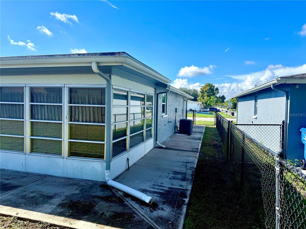Photo of 7625 Embassy Boulevard, Port Richey, FL 34668 (MLS # TB8552976)