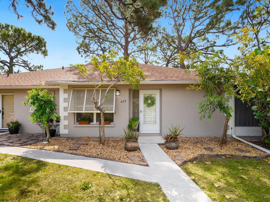 Don't miss this incredible opportunity to own a beautifully updated two-bedroom, two-bath villa in the sought-after community of Jefferson Pines, just minutes from vibrant downtown Sarasota. Enjoy world-class dining, shopping, theaters, opera and year-round events right at your fingertips nearby, all while in a serene, fairytale-like setting. This charming end-unit villa features a spacious, open layout with crown molding and recessed lighting. The upgraded kitchen is a standout, boasting granite countertops, an abundance of raised ceiling cabinetry with stained glass inlays, and a seamless flow into the living and dining areas. Both baths are tastefully updated, with the primary suite offering a unique tile atrium shower that adds a spa-like touch. Relax or entertain in your private, screened-in lanai, or take a short stroll to the sparkling community pool. Additional highlights include a newer air conditioner (2021), new roof (2022) and two assigned parking spaces conveniently right outside your front door. A must-see, great investment!