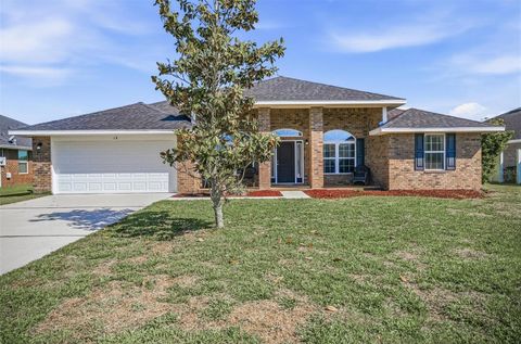 Photo of 18 Eagle Lake Drive, Flagler Beach, FL 32136 (MLS # FC317878)