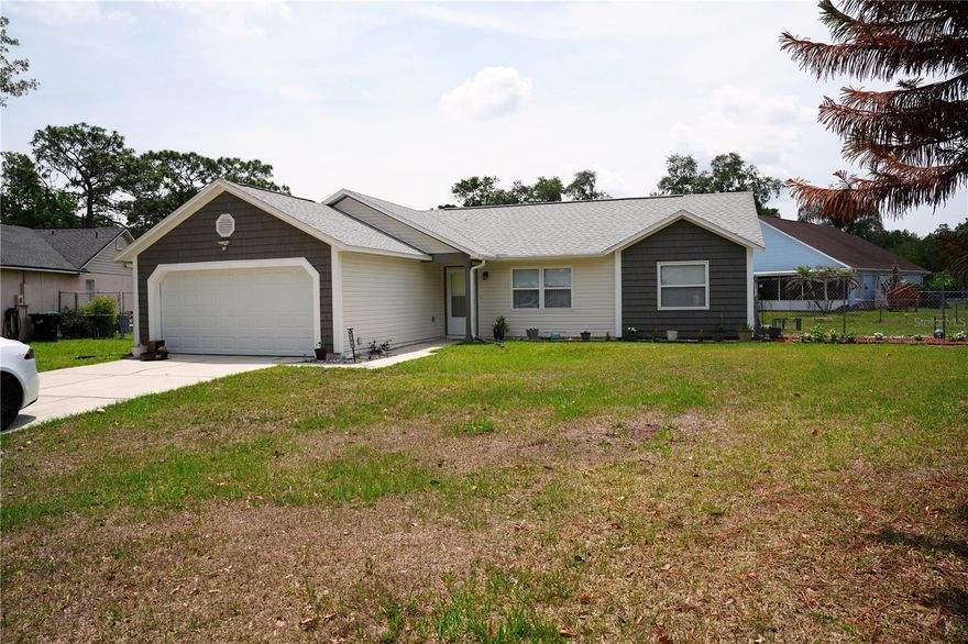 Charming & Convenient: Your Dream Home Awaits in East Orlando!
 Discover the perfect blend of comfort and convenience in this charming 3-bedroom, 2-bath single-family home in East Orlando. Featuring a 2-car garage and 1,318 sq ft of living space, this property is an ideal opportunity for families or investors looking for a prime location near top schools, UCF, and major highways. TURNKEY...Recently updated kitchen, bathrooms, interior paint, AC, and Roof.