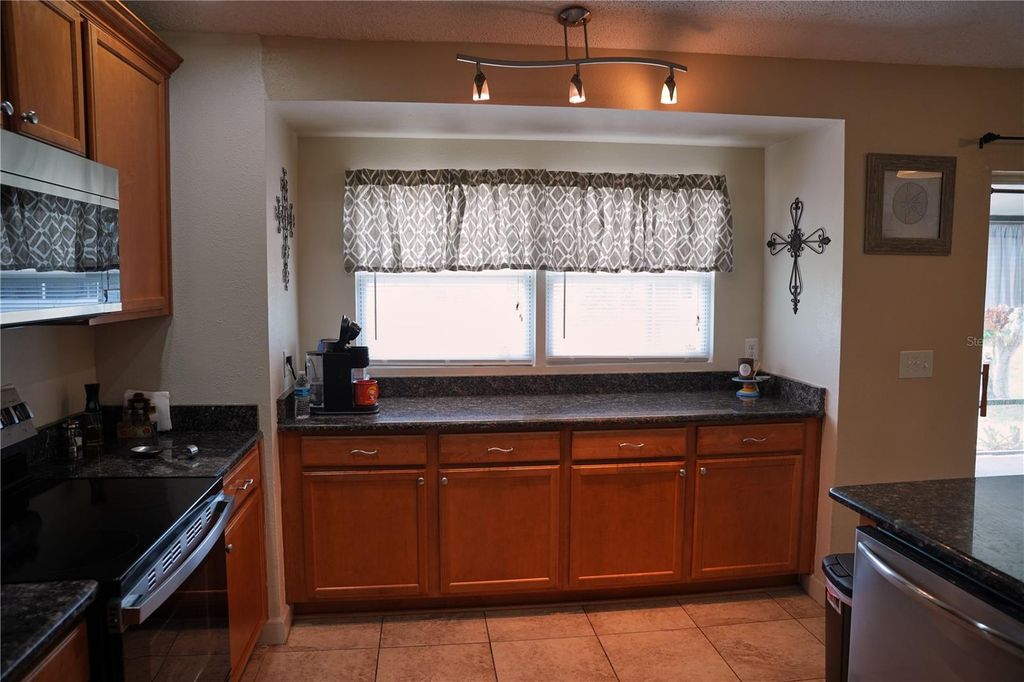 Photo of 9705 Lingwood Trail, Orlando, FL 32817 (MLS # S5149681)