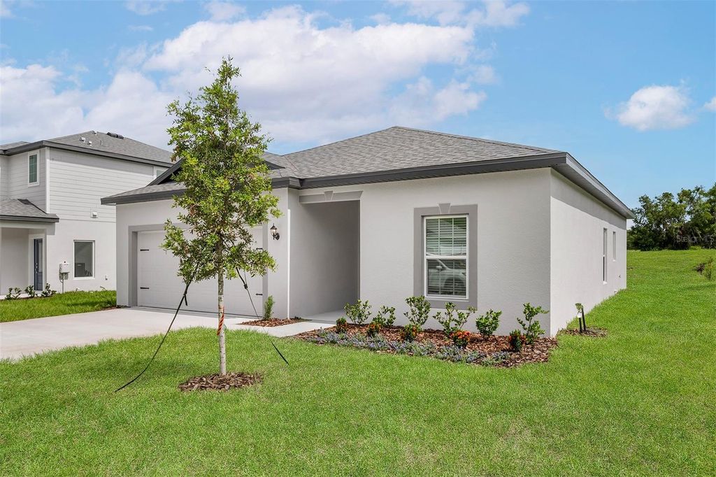 Photo of 13340 Tula Loop, Astatula, FL 34705 (MLS # TB8491048)