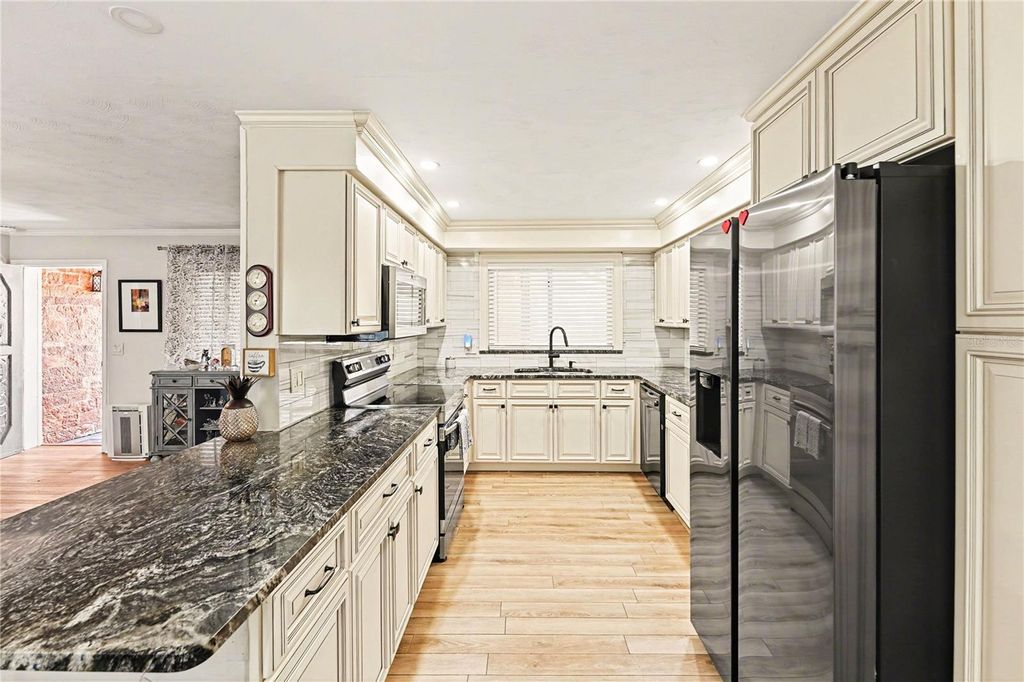 Photo of 1362 Stratford Drive, Clearwater, FL 33756 (MLS # TB8489665)