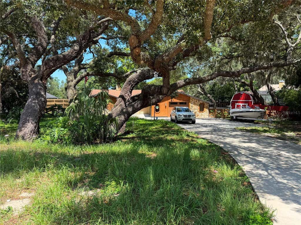 Photo of 325 Gulfport Lane, Spring Hill, FL 34608 (MLS # TB8531764)