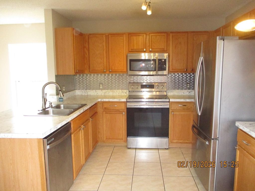 Photo of 2881 Kokomo Loop, Haines City, FL 33844 (MLS # L4959900)