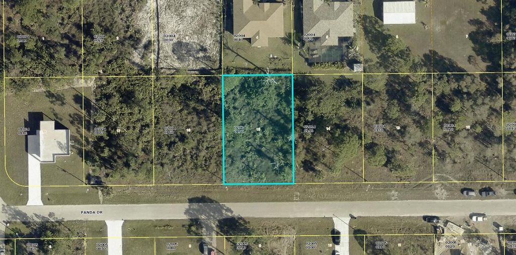 Photo of 941 Panda Drive, Lehigh Acres, FL 33974 (MLS # A4687137)