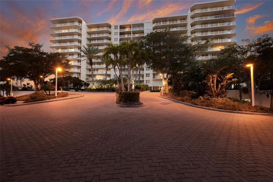 Experience the pinnacle of coastal living at L'Elegance on Lido Key, where this rare corner and end unit provides an enhanced sense of privacy and an abundance of natural light. The residence is anchored by a massive, expansive balcony that serves as a private open-air gallery, wrapping around the unit to capture a breathtaking trifecta of views spanning the turquoise Gulf of Mexico, the serene Sarasota Bay, and the glittering Downtown Sarasota skyline. This sprawling terrace is the perfect stage for watching the sunrise over the city and the sunset over the Gulf, all from the comfort of your own retreat. Inside, the open split-bedroom floor plan offers a sophisticated canvas for your personal vision, inviting you to bring a custom touch to a high-floor interior and tailor the aesthetic to your exact standards. The primary suite is a serene coastal haven, offering direct slider access to the balcony and a large ensuite bath, while guests will appreciate the versatile second bedroom and a dedicated office space complete with a Murphy bed and built-ins. Beyond the unit, you will enjoy the peace of mind that comes with a building that defines the standard for being well-managed; with a new roof installed in 2025, a soon-to-be-redesigned lobby, and new elevators, all major improvements and storm-related repairs are complete with all prior assessments paid. Residents can dive into resort-style amenities including a Gulf-front pool, tennis courts, and a fitness center, all while being situated just minutes from the world-class dining and luxury shopping of St. Armands Circle.