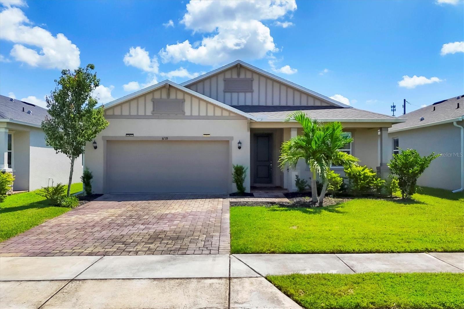 Location. Location. Location. You just can’t beat the lifestyle this community offers! Welcome to this immaculately maintained 4 bedroom, 3 bathroom home where modern finishes, thoughtful design, and everyday comfort come together seamlessly.
As soon as you arrive, the pavered driveway, charming front porch, and manicured landscaping set the tone for the warmth and care this home has received. Step inside and you’ll be greeted by an open and inviting floor plan, featuring wood-look tile throughout the main living areas that adds both elegance and durability.
The heart of the home is the spacious great room, perfectly designed for family gatherings, movie nights, or entertaining friends. The chef-inspired kitchen is complete with stainless steel appliances, solid wood cabinetry, and gleaming granite countertops, making it a space you’ll love to cook and create memories in.
A true highlight is the split floor plan, providing privacy for everyone. The guest bedroom features its own ensuite bathroom, ideal for visitors, extended family, or even a private home office. The remaining bedrooms feature luxury vinyl plank flooring, ensuring low maintenance and timeless appeal.
Step outside into your expansive backyard, a blank canvas with endless possibilities. Whether you dream of adding a pool, creating an outdoor kitchen, or simply enjoying Florida sunshine in a peaceful setting, this space offers the flexibility to design your own private oasis.
Beyond the home, the location is unbeatable. Everyday conveniences are just minutes away with major grocery stores, restaurants, and shopping nearby. For lifestyle and entertainment, you’re close to UTC Mall, Waterside Place, and an array of cultural and dining experiences. And of course, Florida’s world-famous beaches are just a short drive away, making weekend getaways effortless. Families will also love the added benefit of being zoned for A+ rated schools.
Even better—this home has NO CDD fees, giving you more value and peace of mind.
Whether you’re starting fresh, expanding for a growing family, or looking for your forever Florida retreat, this home offers the perfect balance of location, comfort, and opportunity.