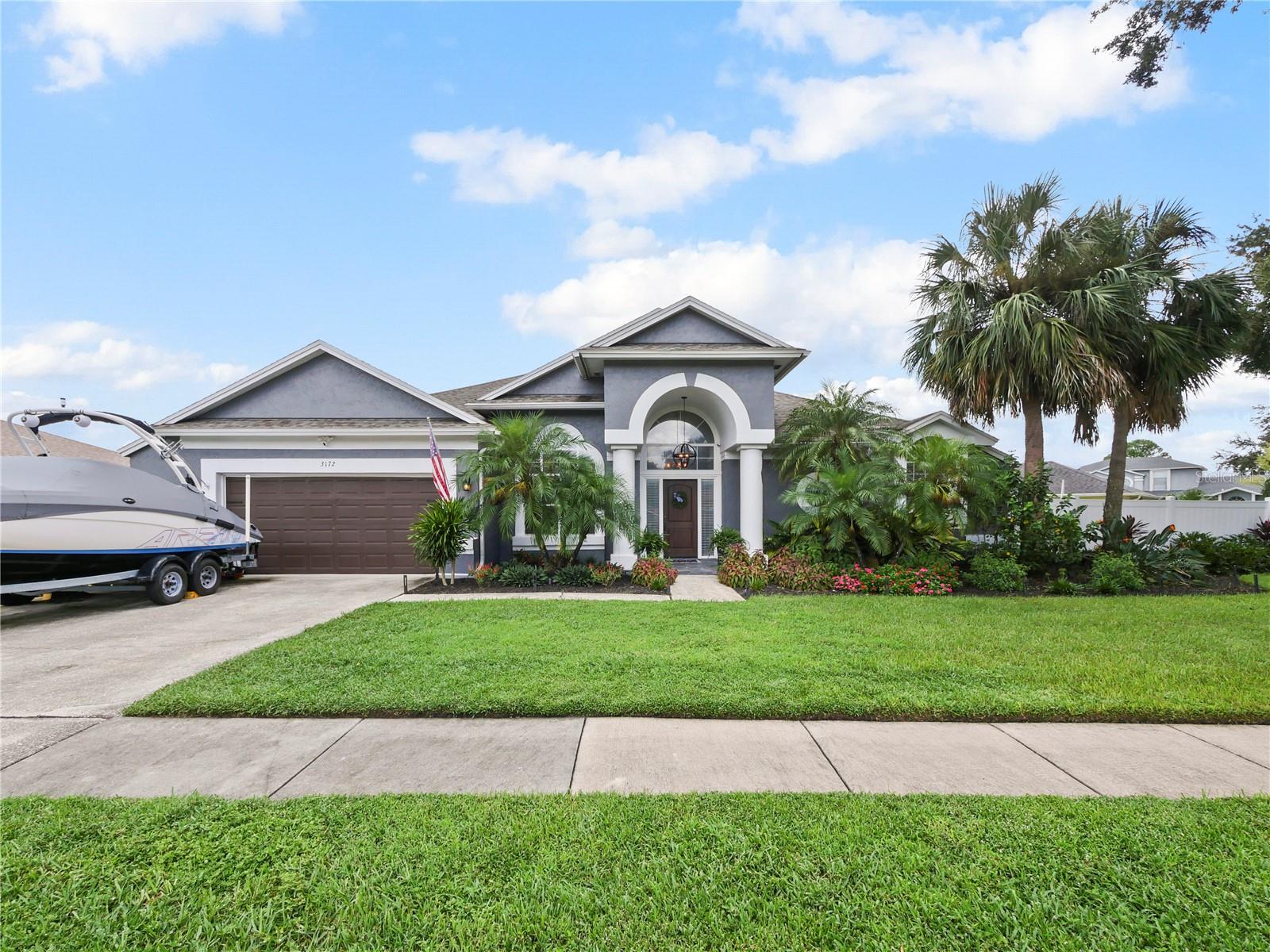 **RARE OPPORTUNITY TO ASSUME SELLER'S LOW INTEREST RATE MORTGAGE** Welcome to this beautifully updated home in the highly sought-after Southfolk neighborhood in downtown Orlando. Situated on a fenced-in quarter-acre lot with a private pool, oversized covered lanai, and firepit, this residence offers the perfect combination of modern upgrades and timeless charm. Inside, you’ll find vaulted ceilings, abundant natural light, and stunning wood-look tile flooring throughout. The upgraded kitchen shines with quartz countertops, stainless steel appliances, and ample storage, opening seamlessly to the main living areas. The living room features an upgraded wood-burning fireplace along with built-in surround sound and exterior speaker wiring, making it ideal for entertaining. Freshly painted interior and exterior finishes give the home a crisp, move-in ready feel. The upgraded master bath and California closet adds both function and style, while comfort and efficiency are ensured with a newer roof and AC, new water heater, plus new ducts and insulation for peace of mind. Outdoors, enjoy the expansive yard, sparkling pool, oversized covered lanai, and cozy firepit—perfect for gatherings or quiet relaxation. With its unbeatable location close to everything downtown Orlando has to offer, this home truly checks all the boxes.