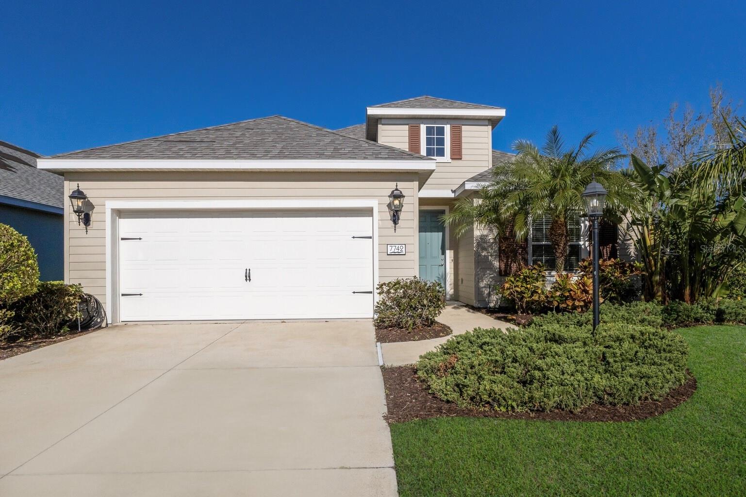 One or more photo(s) has been virtually staged. NEW ROOF & NEW HOT WATER TANK JUST INSTALLED! Tucked away in the quiet and desirable Ridge at Crossing Creek community, this charming 3-bedroom, 2-bathroom home offers 1,669 square feet of bright, open living space. Built by Neal Communities in 2016, this well-maintained home is a true hidden gem, without the burden of a CDD fee. As you enter, you’ll immediately notice the spacious foyer that leads to a welcoming open floor plan designed for modern living. The main living areas feature neutral tile flooring, and the freshly painted interior creates a light and airy ambiance throughout. The living room is enhanced with a tray ceiling and sliding glass doors that open to the lanai, bringing the outdoors in and offering the perfect space for relaxation.The kitchen boasts white cabinetry, sleek granite countertops, a beautiful glass tile backsplash, and stainless steel appliances. A pantry provides plenty of storage, and the breakfast bar adds both style and functionality. The kitchen flows seamlessly into the dining area and living room, making it ideal for both family living and entertaining guests. The owner’s suite is positioned near the rear of the home and offers abundant natural light, dual walk-in closets, and a stylish barn door that separates the bedroom from the en-suite bath. The en suite bathroom features dual sinks, white cabinetry, and a walk-in shower. The two additional bedrooms, along with a full bathroom, are thoughtfully located on the opposite side of the home, providing privacy for both family members and guests. Outside, the covered patio provides a tranquil setting for enjoying your morning coffee or unwinding at the end of the day. The large backyard offers plenty of room for outdoor activities, gardening, or simply enjoying the Florida sunshine. A laundry room, built-in storage nook and 2-car garage complete the picture. Ridge at Crossing Creek is a gated community that offers residents access to a community pool and spa with scenic pond views, as well as a covered seating area with an outdoor grill, perfect for gathering with neighbors and friends. With easy access to SR 70 and I-75, you'll enjoy a prime location close to shopping, dining, entertainment, and more. The University Town Center Mall, Lakewood Ranch Main Street, Benderson Park, SRQ Airport, and the area’s beautiful beaches are just a short drive away.