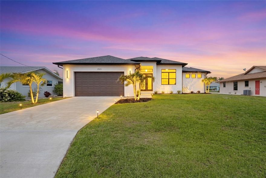 One or more photo(s) has been virtually staged. An exceptional waterfront residence featuring the award-winning Model 1866 from the 2020 Parade of Homes. This BRAND NEW CONSTRUCTION home showcases MODERN FINISHES and ELEVATED INTERIOR DESIGN throughout, delivering a true luxury living experience.

Designed with flexibility in mind, the layout includes an ADDITIONAL BEDROOM / OFFICE / FLEX SPACE—perfect for today’s lifestyle. The interior is loaded with upgrades, including QUARTZ COUNTERTOPS, a spa-like primary suite with a STEP-IN SHOWER WITH DUAL RAIN HEADS, and HIS & HERS WALK-IN CLOSETS.

Step outside and enjoy the ultimate Florida lifestyle with a FULLY EQUIPPED OUTDOOR KITCHEN, a GUNITE STEP-IN SWIMMING POOL, and UPGRADED LANDSCAPING that enhances curb appeal and privacy. Situated on a premium lot, this home offers WATERFRONT LIVING WITH DIRECT GULF ACCESS, complete with a REINFORCED CONCRETE SEAWALL—ideal for boating and water enthusiasts.

An ELEVATION CERTIFICATE ON HAND with INSURANCE QUOTES AVAILABLE UPON REQUEST provides added confidence and value.

This is a rare opportunity to own a move-in-ready luxury waterfront home—schedule your private showing today before it sails away.