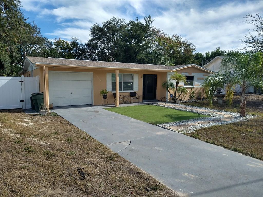 Photo of 12910 College Hill Drive, Hudson, FL 34667 (MLS # W7877864)