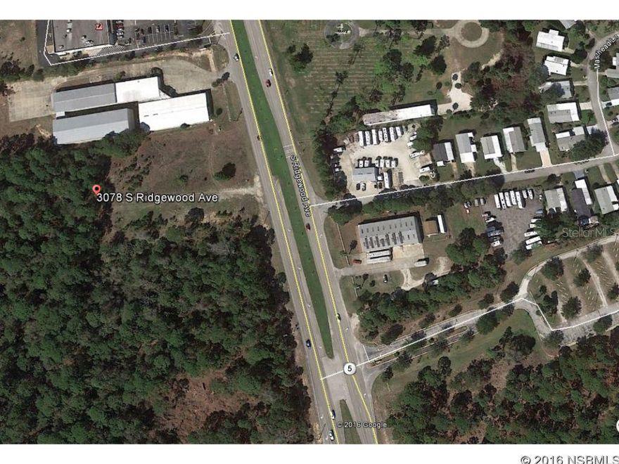 Commercial property on U.S.Hwy 1/Ridgewood Ave. Mostly cleared with 265ft of frontage on U.S. Hwy 1/Ridgewood; Cleared: Partial ;Water: Available at Site