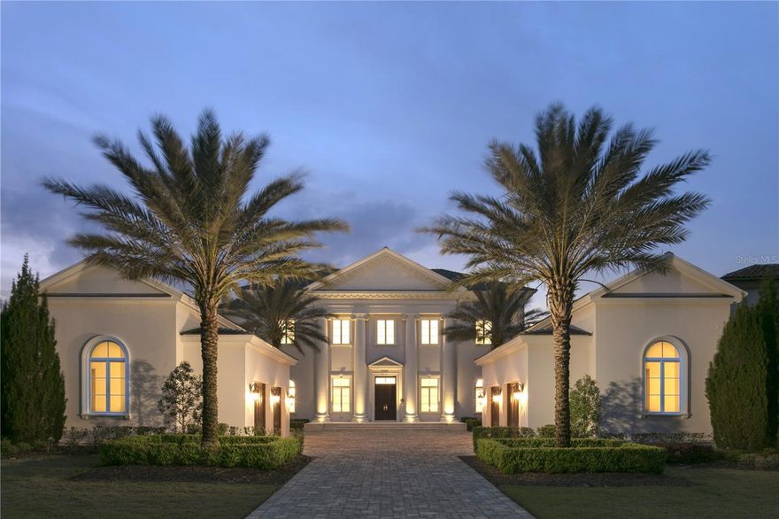 One or more photo(s) was virtually staged. Located in the coveted Carolwood Reserve neighborhood of Golden Oak at the Walt Disney World ® Resort, this gracious estate is nestled on a private, oversized homesite. This elegant luxury home offers unparalleled tranquility and breathtaking views. Situated overlooking a picturesque pond and lush golf course, every moment here is a masterpiece of serenity. Step into opulence as crystal chandeliers adorn every corner, casting a radiant glow across the spacious interior. The grand sweeping staircase serves as a majestic centerpiece, inviting you to explore every corner of this magnificent abode. Indulge in the epitome of comfort and style with six generously appointed bedrooms and six baths, providing ample space for relaxation and rejuvenation. The primary suite is a sanctuary unto itself, boasting a wrap-around balcony that offers unparalleled vistas of the shimmering lake and manicured greens of the golf course. For the discerning collector or automotive enthusiast, a four-car garage awaits, ready to house your prized possessions with ease and sophistication. Whether entertaining guests in the lavish living spaces or escaping to your private retreat, this home offers the perfect blend of luxury and tranquility. Don't miss the opportunity to make this exquisite estate yours and elevate your lifestyle to new heights. Welcome home to elegance, privacy, and unmatched beauty. Golden Oak at Walt Disney World® Resort is a residential resort community where families can live in the embrace of luxury, privacy and the magic of Disney. This gated community features distinctive neighborhoods of magnificent homes, expansive natural preserves, and inviting amenities—including access to Golden Oak’s private clubhouse, Summerhouse, with extraordinary dining options, courtyards, pool area, fitness facilities, and family room. Residents delight in a special connection to the magic through Club Life, featuring access to the Golden Oak Member Services team, park transportation, signature club events, theme park experiences, and more. Residents also enjoy convenient access to the world-class amenities of Four Seasons Resort Orlando at Walt Disney World® Resort, including the Tranquilo Golf Club, full-service spa, meeting facilities and superlative restaurants.