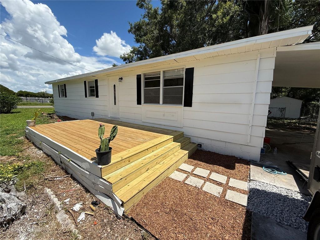 Photo of 801 Monroe Street, Plant City, FL 33563 (MLS # TB8411654)