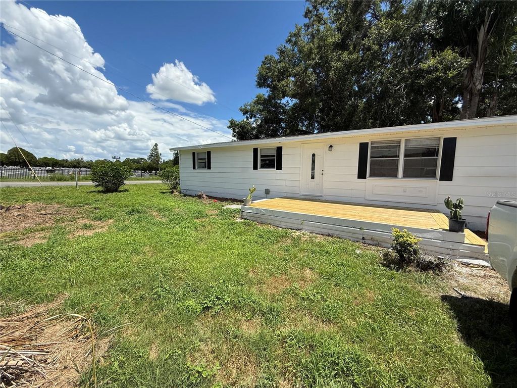 Photo of 801 Monroe Street, Plant City, FL 33563 (MLS # TB8411654)
