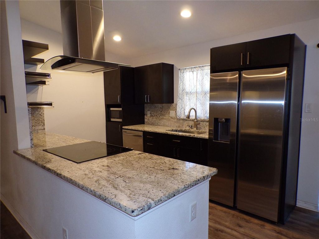 Photo of 10001 Elgin Boulevard, Spring Hill, FL 34608 (MLS # W7883110)