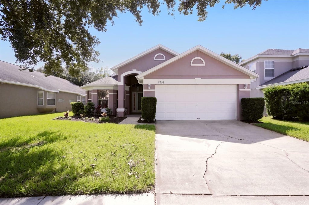 Photo of 8352 Lake Amhurst Trail, Orlando, FL 32829 (MLS # O6451686)