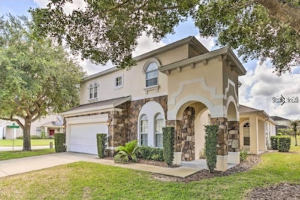 Photo of 214 Tupelo Circle, Davenport, FL 33897 (MLS # S5157226)