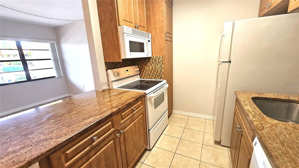 Photo of 8 Quails Run Boulevard #3, Englewood, FL 34223 (MLS # S5145001)