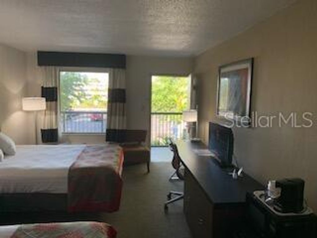 Photo of 7150 N Tamiami Trail #604, Sarasota, FL 34243 (MLS # O6401616)