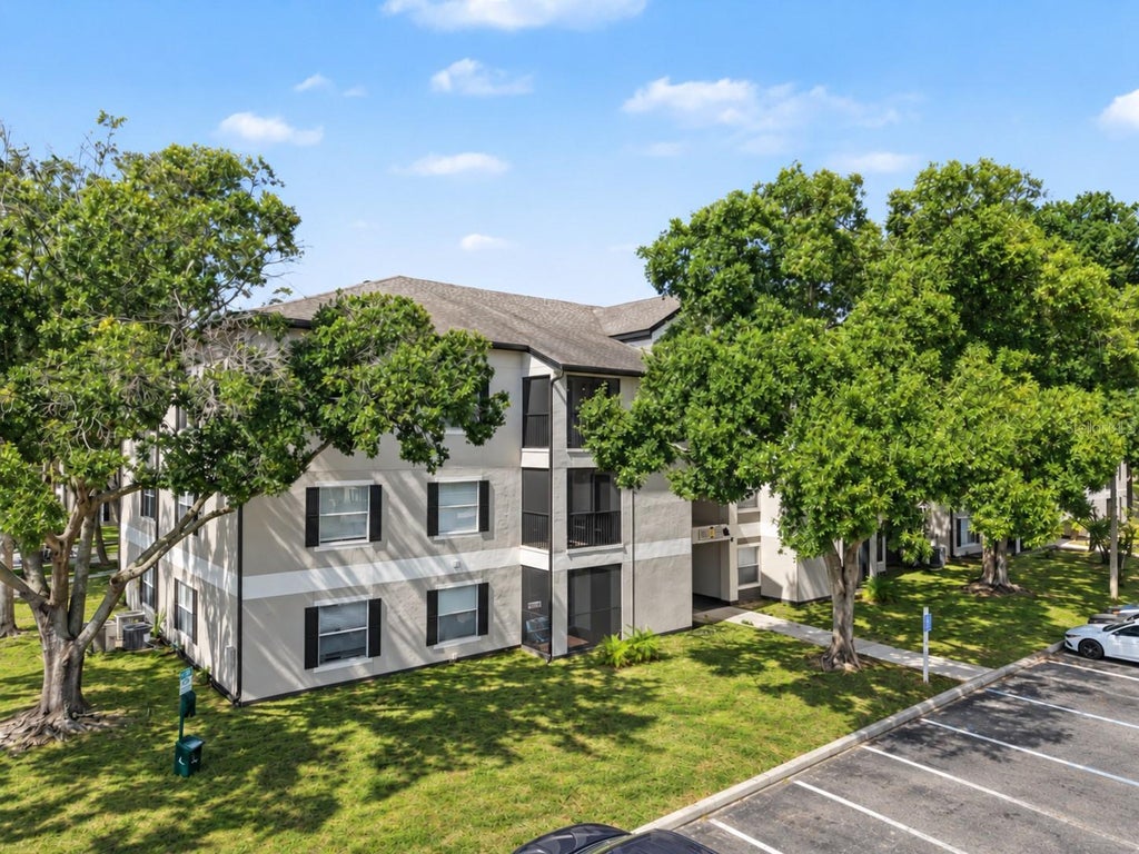 Photo of 7524 Seurat Street #12202, Orlando, FL 32819 (MLS # O6452268)