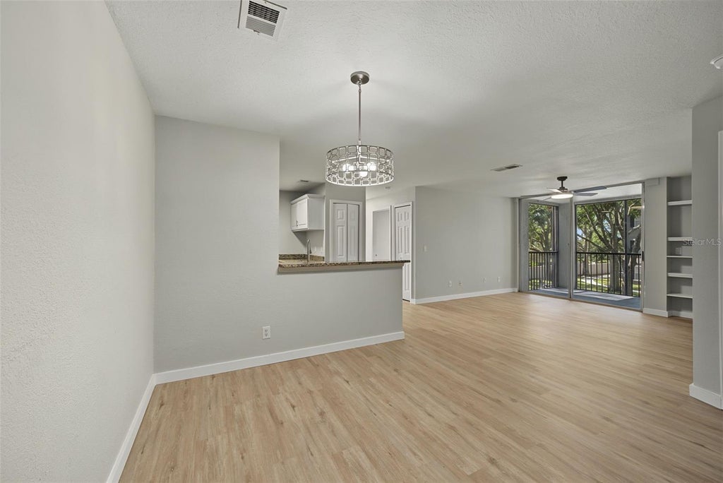 Photo of 7524 Seurat Street #12202, Orlando, FL 32819 (MLS # O6452268)
