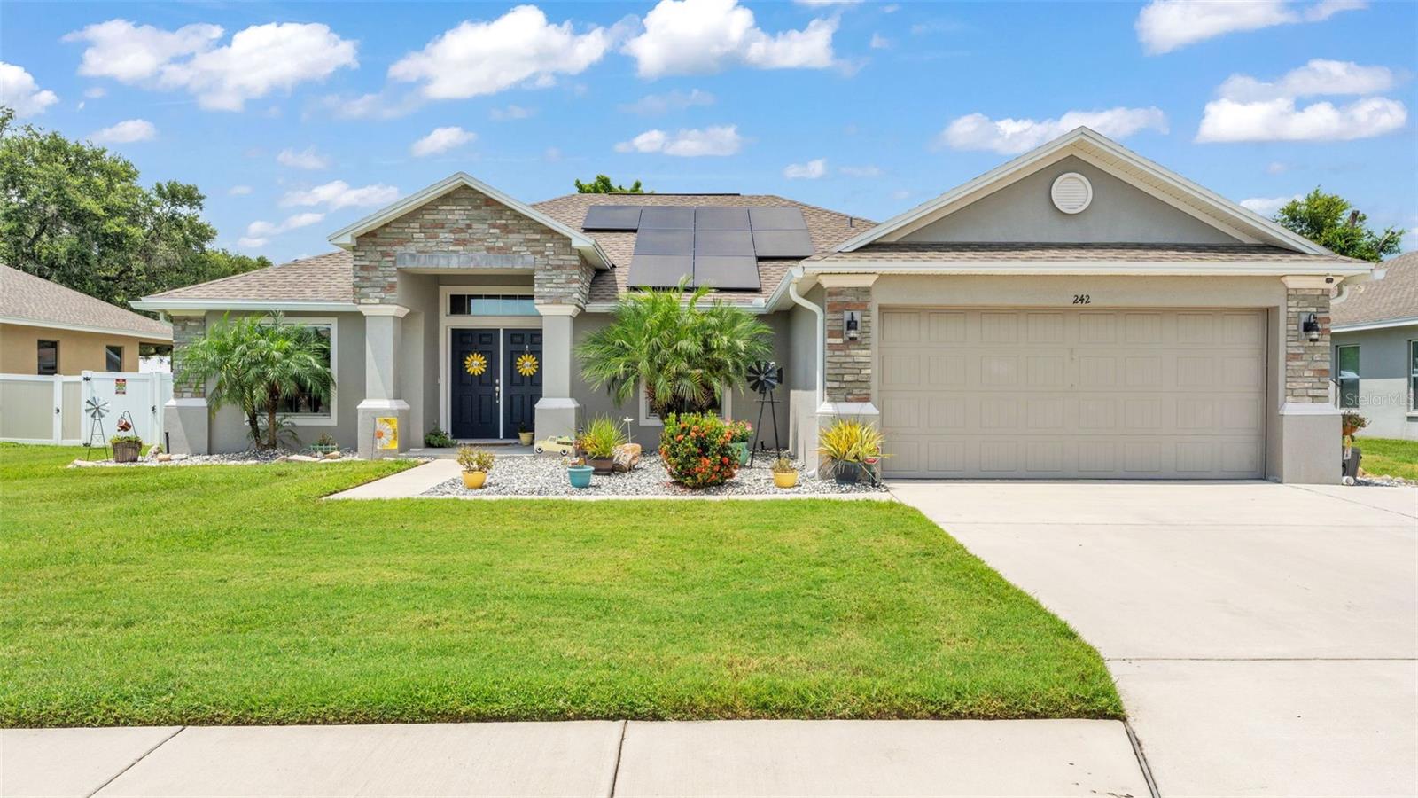 Welcome to your dream pool home! Built in 2020 and loaded with upgrades, this 4-bedroom, 2-bathroom residence offers 1,847 sq ft of stylish and functional living space. Step outside to your private heated or cooled saltwater pool and spa/hot tub added in 2023, complete with a screened lanai and extended 10-ft roof—perfect for relaxing or entertaining.
The kitchen boasts elegant quartz countertops, eat at bar, a sleek tile backsplash, and opens to a bright nook for casual dining that overlooks your backyard oasis. Enjoy 9-ft ceilings and vinyl plank flooring in the living areas and bedrooms, with tile flooring in the kitchen and bathrooms for easy maintenance.
A dedicated home office or flex room features custom saloon-style barn doors, offering the perfect blend of charm and practicality. The custom laundry room and additional walk-in-pantry, extended 3 car driveway, boat/RV parking pad, and fully fenced yard with new 12; double gates provide additional convenience and space.
Additional highlights include a house paint matched shed, water softener system, front and back yard irrigation and Rachio smart watering system, Full house and pool solar panels to help with energy efficiency. This home combines comfort, efficiency, and outdoor living—all in one!
Schedule your showing today and discover all this beautiful property has to provide!