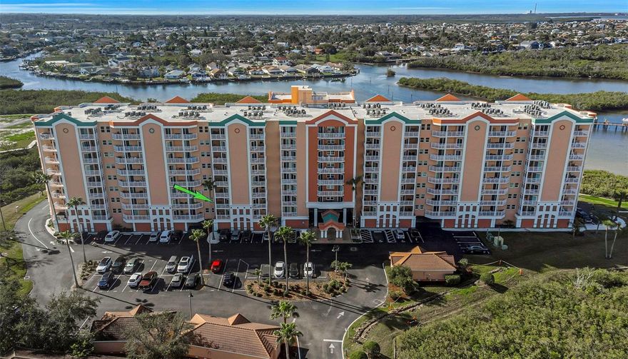 Live where others vacation — enjoy vibrant community events, waterfront relaxation, and effortless coastal elegance in the active waterfront community of Seaview Place at Gulf Landings. From the moment you enter this secure-access building, you’re surrounded by amenities designed for both relaxation and connection - heated waterfront pool with jacuzzi, cabanas, outdoor showers, and grilling area, plus multiple amenity levels including a rentable clubhouse with full kitchen, pool table and baby grand piano, business center and library, fitness center with two saunas, aerobics room, and a stunning rooftop deck with breathtaking Gulf views. Boat lifts are occasionally available for purchase or rent, and owners have the option to join Gulf Harbors Beach Club for private beach access and events. HOA fees include water, sewer, trash, basic cable, onsite management, and full amenity access. 
This move-in-ready 2-bedroom, 2-bath third-floor condo is conveniently located near the elevators and features a bright open living area with updated lighting and access to one of two private balconies. The kitchen offers hardwood cabinets, granite countertops, and a breakfast bar seating area. The split-bedroom layout offers privacy and comfort, with a spacious primary suite featuring its own private balcony, dual vanities, a soaking tub, walk-in shower, multiple linen closets, and a generous walk-in closet. The guest bedroom also offers a large walk-in closet and convenient access to the full guest bath. With in-unit washer and dryer, no age restrictions, and the ability to rent immediately (3-month minimum), this property is perfect as a full-time residence, seasonal escape, or income-producing investment.