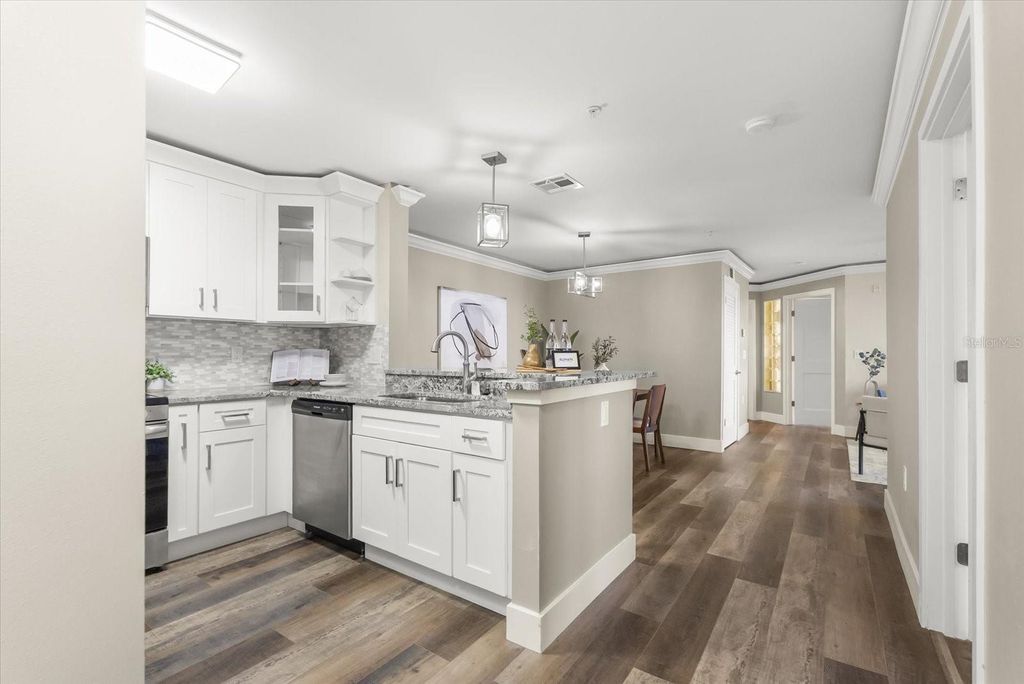 Photo of 1919 Summer Club Drive #105, Oviedo, FL 32765 (MLS # O6369757)