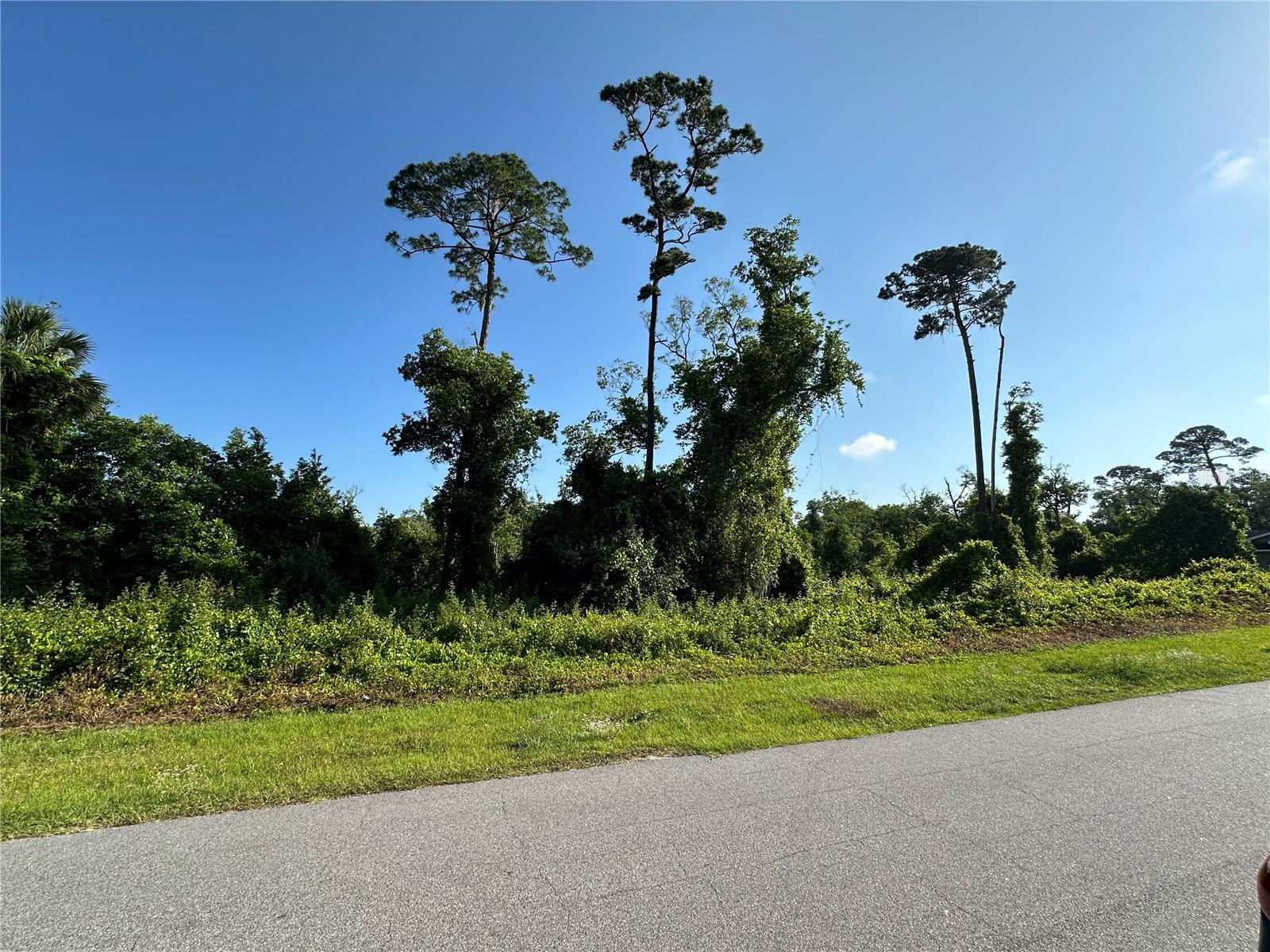 A vacant lot nestled on a serene and quiet street, available like a canvas waiting to be painted. This rare opportunity and untapped potential await you. The tranquility of the surroundings invites contemplation, offering a peaceful sanctuary amidst the bustling world outside.