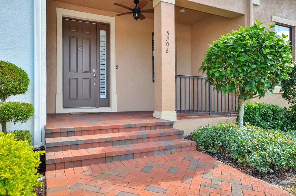 Photo of 5906 Yeats Manor Drive, Tampa, FL 33616 (MLS # T3496503)