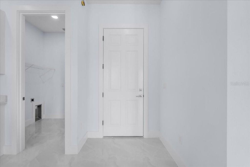 Photo of 1927 Richmond Avenue N, Lehigh Acres, FL 33972 (MLS # TB8490281)