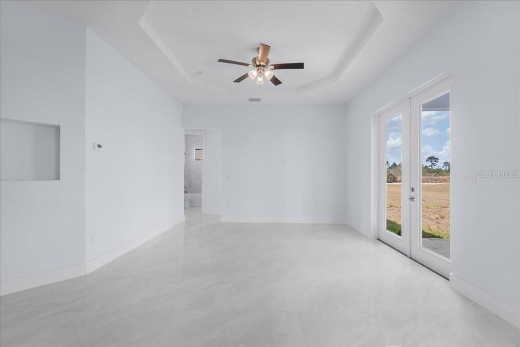 Photo of 1927 Richmond Avenue N, Lehigh Acres, FL 33972 (MLS # TB8490281)