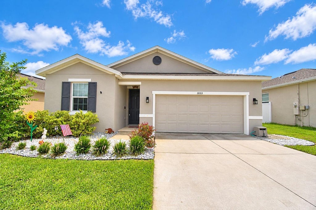 Photo of 1033 Heirloom Drive, Haines City, FL 33844 (MLS # P4939938)