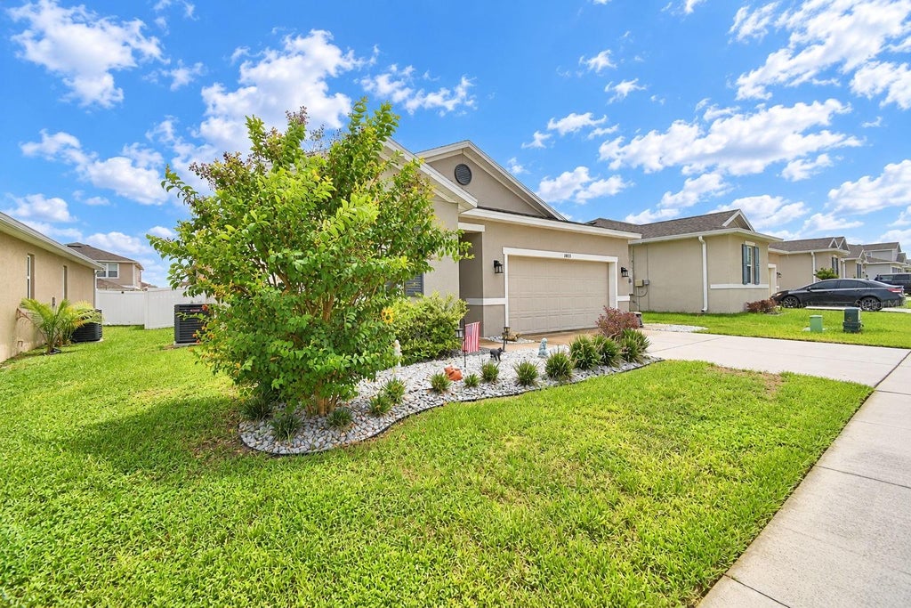 Photo of 1033 Heirloom Drive, Haines City, FL 33844 (MLS # P4939938)