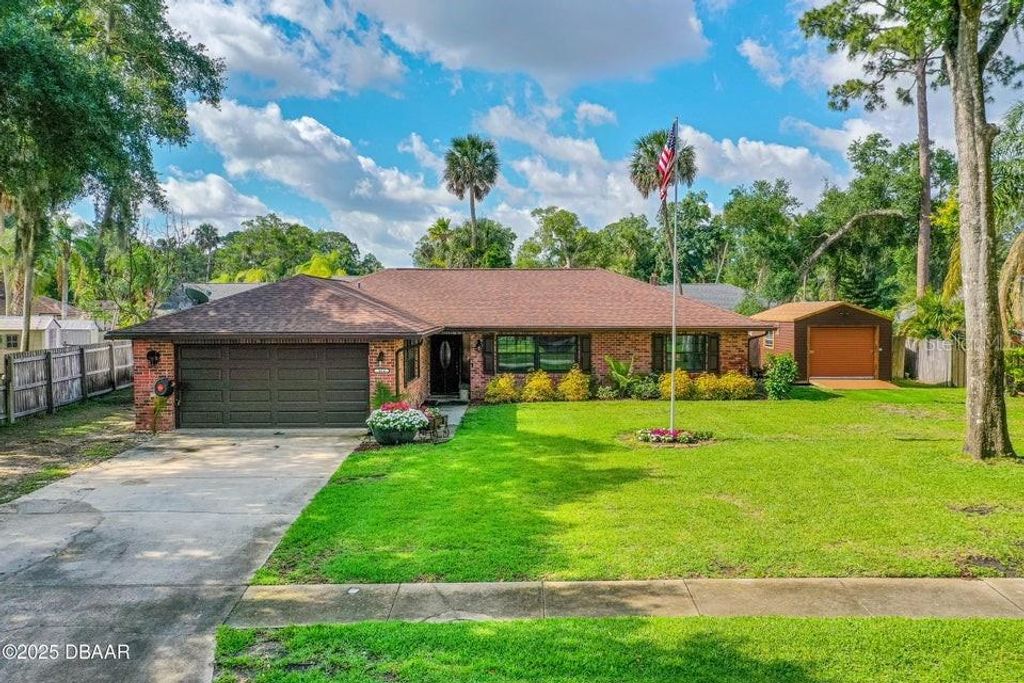 Photo of 464 Woodstock Drive, Port Orange, FL 32127 (MLS # NS1087004)