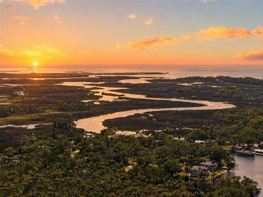 Photo of 6086 Island Drive, Weeki Wachee, FL 34607 (MLS # W7888520)