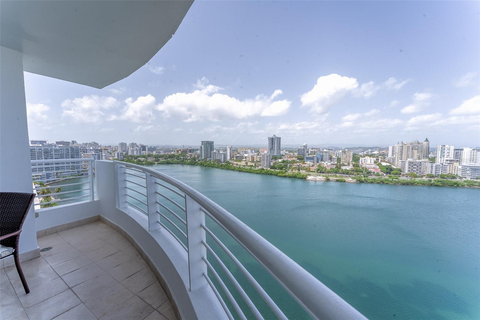 Welcome to REGATTA, a one-of-a-kind property offering a full floor unit with 2,410 sqft. Featuring 3 parking spaces, breathtaking 360-degree beach and lagoon views, and sold fully equipped with furniture included. This mint condition unit comes with two storage areas and full backup power generator. A new cistern and elevators recently installed in the complex further enhance its appeal. Just bring your clothes and move right in! Hurry, this opportunity won't last long.