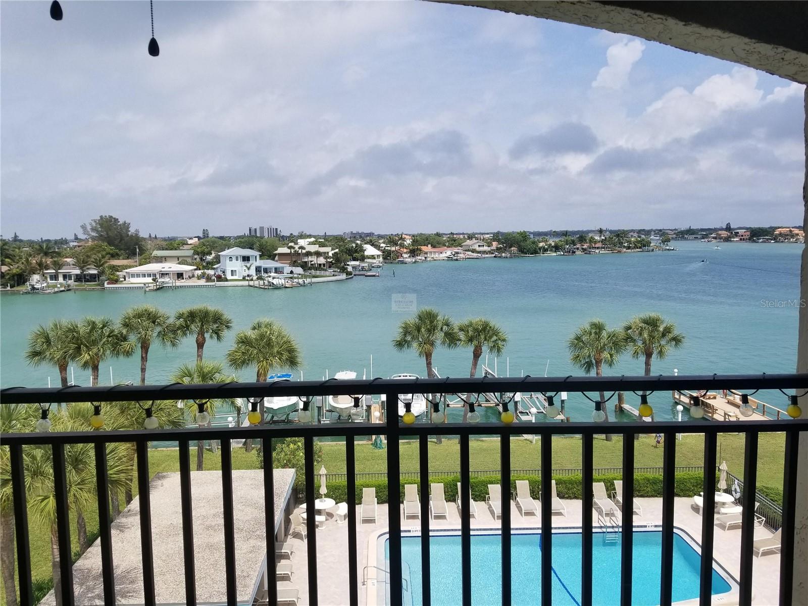 NOW Available NOVEMBER 1, 2025 FOR THE WINTER SEASON 2026. Blind Pass Lagoon top floor 2 bed 2 bath open water views of the intercoastal waterway and the pool. Perfect location, directly across from the beach and steps to many restaurants and shopping nearby. The condo is very spacious and has great views from the large balcony accessible from the living room and master suite. there is fishing pier for your use. The condo is completely furnished and has every amenity you will need for your stay. Washer and dryer inside the condo, There is a poolside storage that contains beach chairs and pool toys. There is also a large covered area next to the pool with table and chairs for your personal use. Sorry no pets.