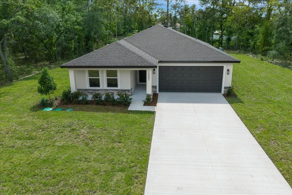 Photo of 13483 Flemington Road, Brooksville, FL 34614 (MLS # O6416632)