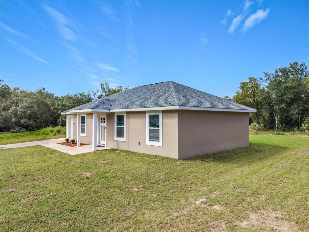 Photo of 22787 SW Beach Boulevard, Dunnellon, FL 34431 (MLS # OM734272)