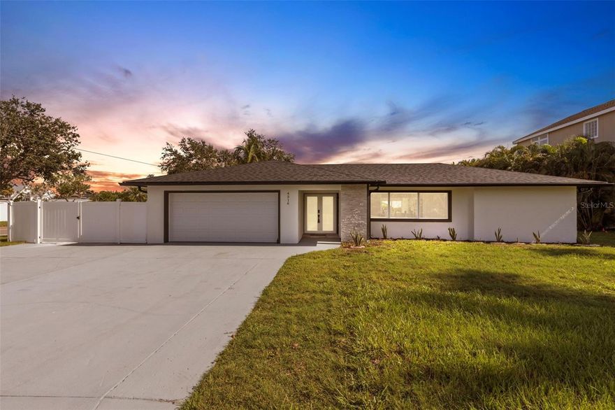 Exquisite 4BD/4BA Snead Island Oasis: Fully Renovated Luxury Steps from Bradenton Yacht Club

Discover an unparalleled blend of chic design and serene island living at 4316 Caloosa, a magnificent residence nestled on the coveted Snead Island in Palmetto. This property has undergone a comprehensive, full rehabilitation, meticulously redesigned to present a contemporary open layout featuring four beautiful bedrooms and four full bathrooms. Every detail has been thoughtfully curated, showcasing high-end finishes throughout, from the elegant wainscoting trim detail that adds a layer of classic charm to the sleek, modern waterfall countertops that define the gourmet kitchen. The heart of this home boasts all-new, state-of-the-art appliances and custom cabinetry, ensuring a turn-key experience where luxury meets functionality. For your complete peace of mind, this home features all new hurricane-rated doors and windows, and the roof was replaced in 2025. Everything is done and is new, offering a truly impeccable residence.

Beyond the exquisite interiors, this home offers an exclusive lifestyle defined by its Snead Island location. Imagine waking up to the tranquility of an island where peace and quiet prevail, surrounded by a community predominantly composed of fellow boaters. Enjoy your own private pool and a spacious rear deck, with a cement pad and electricity already in place for a hot tub, creating the perfect oasis for entertaining and relaxation. Situated on an oversized lot, the property offers ample room to store jet skis or even an RV on the side of the home. An elevated AC unit ensures optimal performance, and next to your dock, you'll find a small fishing station. From here, your boat takes you to the open waters quickly with deep water access. Just a short stroll from your doorstep lies the esteemed Bradenton Yacht Club, offering a full boat yard, yacht club facilities, and a true country club experience. For added convenience, a public boat launch is also nearby, providing effortless access to the pristine waters. Nature enthusiasts will appreciate the close proximity to Emerson Pointe, offering natural beauty and outdoor recreation. This is more than just a home; it's an invitation to a unique, amenity-rich sanctuary where the discerning boater and those seeking an exclusive, tranquil retreat can truly thrive.

Opportunities like this are rare. Experience unparalleled luxury and island living. Contact us for an exclusive tour and make 4316 Caloosa your new address.
Weblink for Property:https://listings.hi-reshomes.com/sites/wekgxrg/unbranded