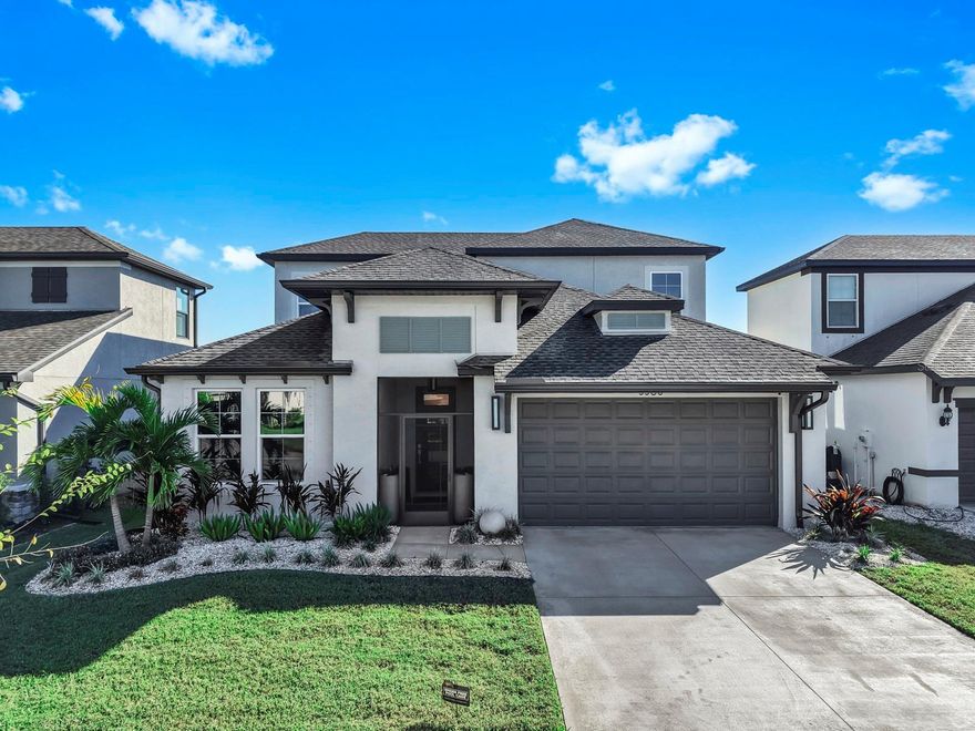 Welcome to this exquisite and tastefully designed home in the coveted community of Hidden Creek. This stunning residence features 4 bedrooms, 4 bathrooms, a 2-car garage, and a thoughtfully designed floor plan that combines comfort, style, and functionality. The seller has spared no expense on upgrades, including designer interior and exterior lighting, second floorimpact-rated windows and front door, custom feature walls, LVP flooring throughout all bedrooms and the entire second floor (NO carpet), solar-control window film on all windows, an open staircase with new stairs and risers, whole-house water filtration, whole-house surge protection, professional landscaping with a French drain, gutters on all sides of the home, and a screened front porch enclosure.

Step inside to an inviting, open-concept living area filled with natural light. The entryway features a beautiful stone accent wall that leads into the spacious living room, which flows seamlessly into the dining area and kitchen—perfect for everyday living and entertaining. The gourmet kitchen offers gray solid wood cabinetry, stainless steel appliances, including a wall oven/microwave, electric cooktop, and vent hood, ample quartz counter space, a generously sized pantry, and a large island ideal for casual meals or hosting guests.

The first-floor primary suite is a peaceful retreat, offering a spacious bedroom, walk-in closets, and an en-suite bathroom with dual sinks, a walk-in shower, and expansive storage.

The split floor plan provides exceptional privacy, with two additional bedrooms and two full bathrooms located toward the front of the home. A home office/flex room and interior laundry room are also conveniently located on the first floor.

Upstairs, you’ll find an impressive loft, the fourth bedroom, a full bathroom with a tub/shower combo, and additional storage space—perfect for guests or multi-generational living.

Step outside from the main living area to your private backyard oasis. This beautifully landscaped retreat features a screened-in lanai and a heated saltwater pool with upgraded tile and pool surround. The pool is powered by a premium Hayward system, including a pool pump, SwimClear 200 filter, and Hayward OmniPlus automation. This outdoor space is ideal for relaxing, grilling, and entertaining year-round.

Hidden Creek offers a peaceful, park-like environment while being just minutes from shopping, dining, top-rated schools, medical facilities, and Sarasota’s renowned Gulf Coast beaches.

Don’t miss your opportunity to own this remarkable property—schedule your private showing today!