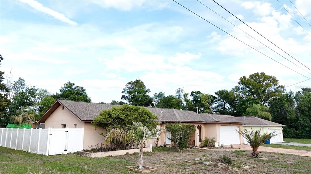 Photo of 5046 Kenmore Street, Spring Hill, FL 34608 (MLS # TB8499844)