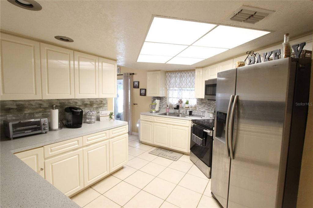 Photo of 5046 Kenmore Street, Spring Hill, FL 34608 (MLS # TB8499844)